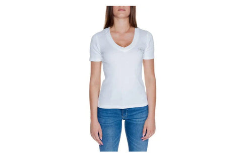 White v-neck t-shirt paired with blue jeans in an Old Money Style elegance look.