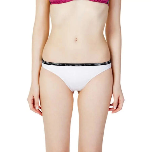 White women’s underwear with black elastic waistband from Calvin Klein Jeans Beachwear