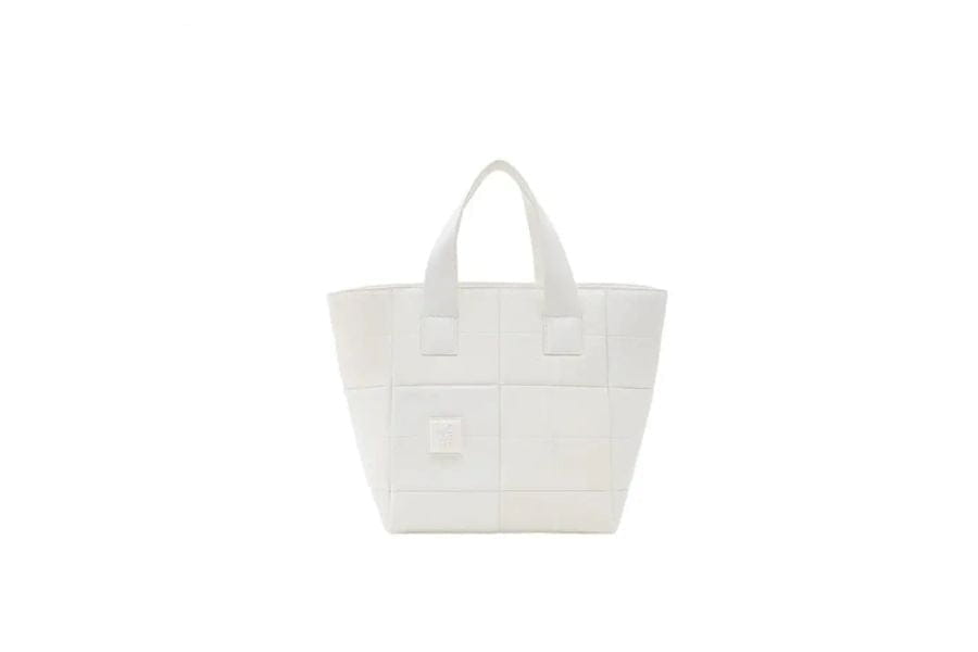 White woven tote bag with handles ideal for stylish summer work outfits and accessories.