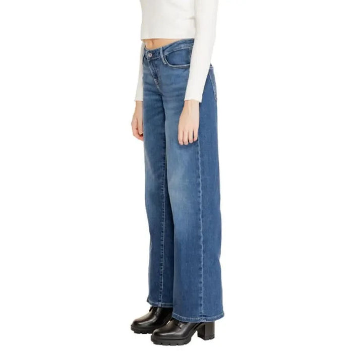 Guess Women Jeans: Wide-leg blue jeans with white top and black boots