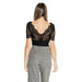 Woman in a black lace top and gray trousers, featured in Morgan De Toi T-Shirt