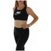 Woman in black Nike sports bra and leggings from Nike Women Top collection