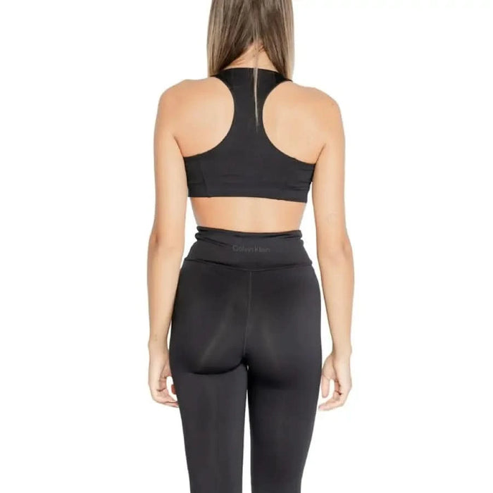 Woman in black workout attire showcasing Calvin Klein Sport Women Underwear