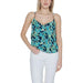 Woman in blue floral top showcasing Morgan De Toi urban city style clothing