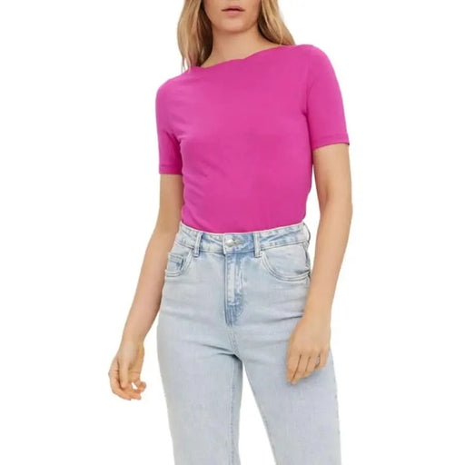 Woman in bright pink top and light blue jeans - Vero Moda Women Top