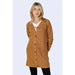 Urban style: Woman in Jacqueline De Yong brown cardigan sweater. Stylish women’s clothing