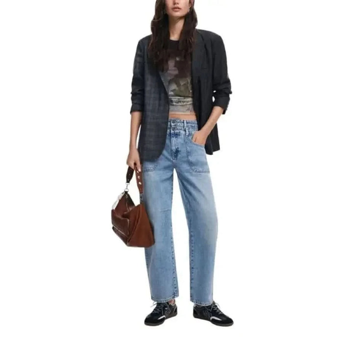 Woman in dark blazer and graphic t-shirt showcasing Desigual Women’s Blazer style