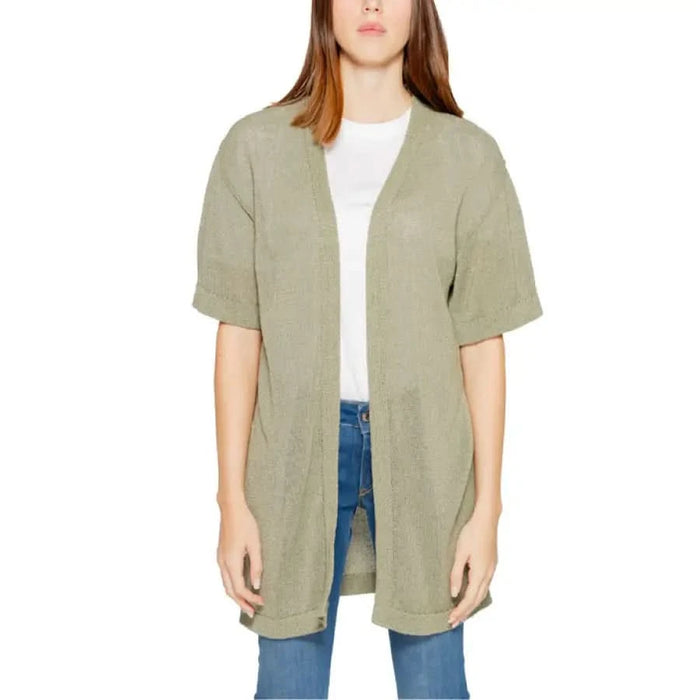 Woman wearing green Jacqueline De Yong cardigan sweater for women