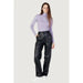 Calvin Klein Jeans Women’s Knitwear: Lavender Turtleneck Sweater & Black Leather Pants