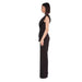 Side profile of woman wearing sleek black Silence Women Jumpsuit