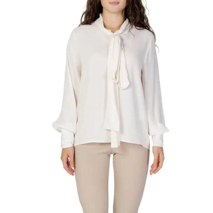 Sandro Ferrone woman in white blouse and beige pants for Sandro Ferrone Women Blouse