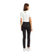 Woman in white short-sleeved top and black pants from behind, showcasing Morgan De Toi Trousers