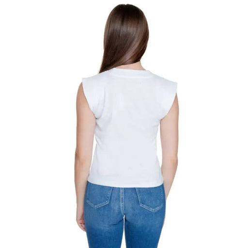 Woman in white sleeveless top and blue jeans for Calvin Klein Jeans Women T-Shirt