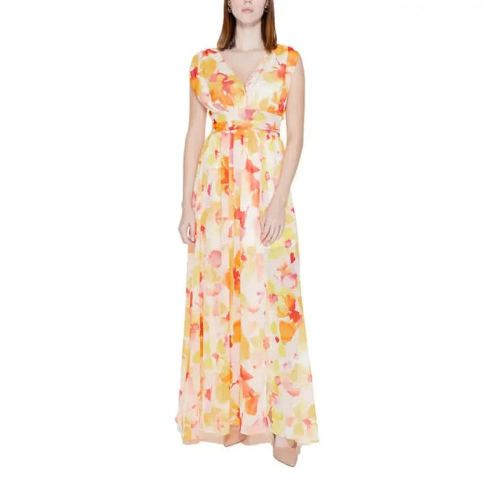 Urban style: Woman in yellow floral print dress - Morgan De Toi Women Dress