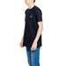 Young boy wearing Hydra Clothing black T-shirt with red and white logo - urban fashion