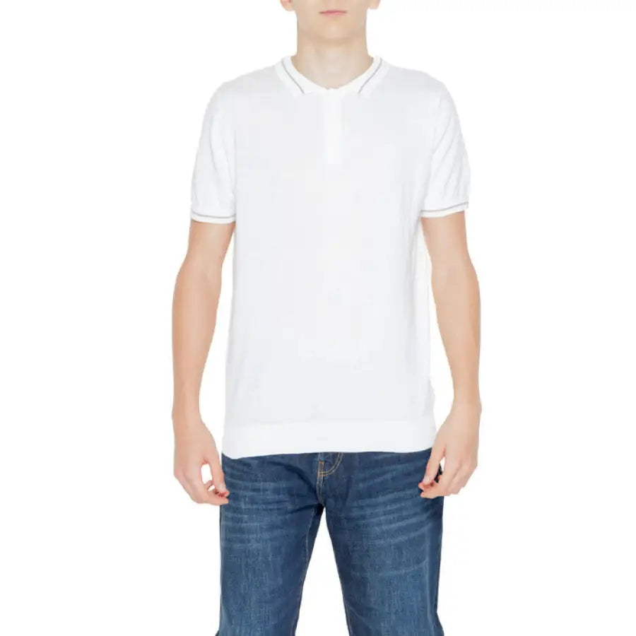 Young boy wearing a white polo shirt from Hamaki-ho Men Knitwear collection