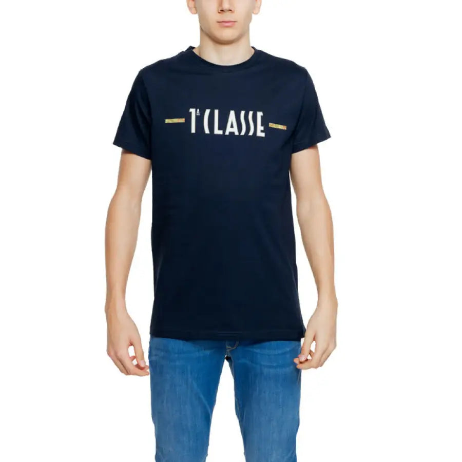 
                      
                        Young man in navy ’I Love’ t-shirt, Alviero Martini Prima Classe Men’s T-Shirt
                      
                    